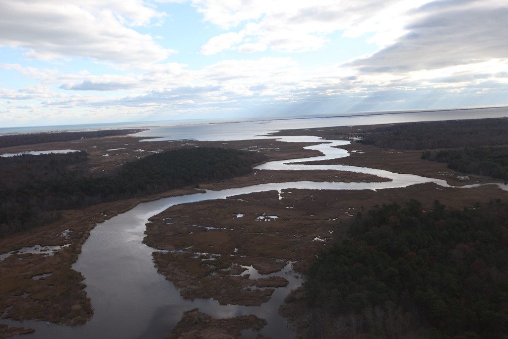Aerial view of tidal marsh and a winding river on Long Island after Hurricane Sandy